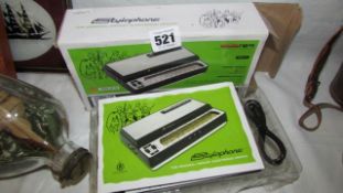 A boxed stylophone