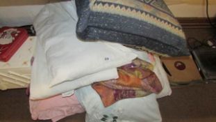 A quantity of linen, cushions etc