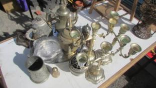 A mixed lot of metal ware including candelabra