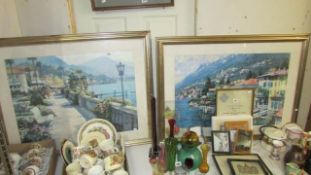 A pair of large framed and glazed prints