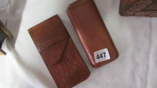 2 leather cigar cases