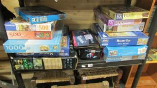 A shelf of games and puzzles