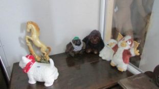 A mixed lot of china and soft toys