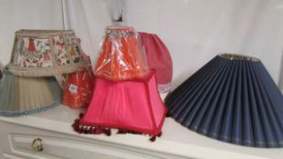 A quantity of lamp shades