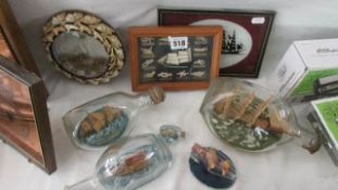 A quantity of nautical collectables including ship's in bottles