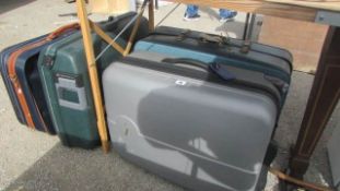 A quantity of old suitcases