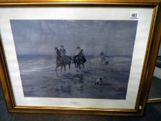 A gilt framed picture A Ride on the Beach