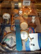 A tray of old watches