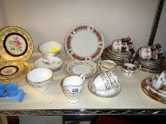 A shelf of old tea ware