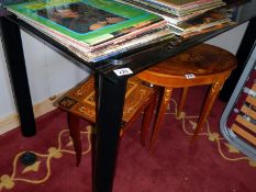 A large glass top dining table