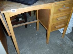 An oak 3 drawer school desk