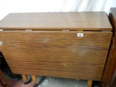 A formica drop leaf table