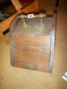 An old Victorian coal box with liner