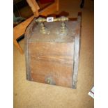 An old Victorian coal box with liner