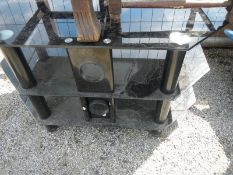 A black glass TV stand