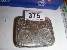 An old metal coin box