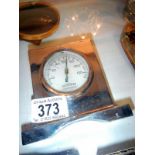 An old chrome car clock