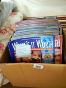 A box of What's it worth magazine