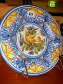 A large inlaid handpainted charger