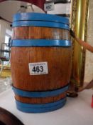 An oval wooden wine barrel