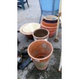 A quantity of garden terracotta pots