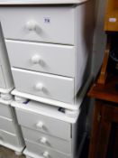 A pair of 3 drawer white chests