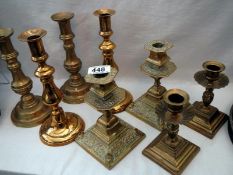 4 pairs of Victorian brass candlesticks