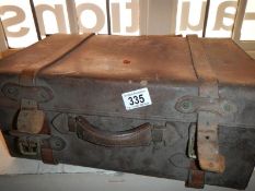 A Victorian leather travelling suitcase