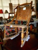 An old pokerwork rocking chair