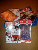 A tray of Lincoln City Imps football programmes