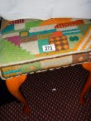 A wool designed top foot stool