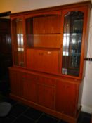 A mahogany drop front dresser