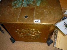 A large old brass coal box
