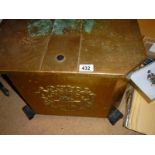 A large old brass coal box