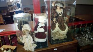 A large doll and 3 others