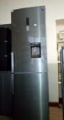 A Samsung fridge freezer with water dispenser