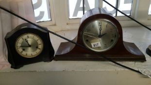 A Bakelite clock and one other