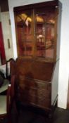 A oak bureau book case