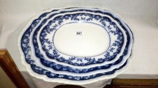 3 blue and white platters