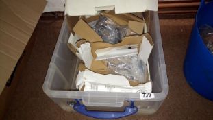 A crate of new sink taps etc