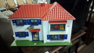 A dolls house and furniture