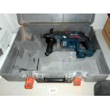 A Bosch hammer drill with charger and battery