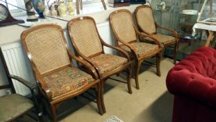 A set of 4 bergere back and seat chairs