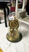 A skeleton clock under glass dome a/f