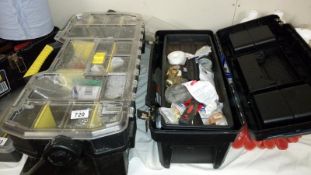 A work box with various fixings and a work box of tools