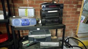 A quantity of videos, electrical items etc for spares and repairs