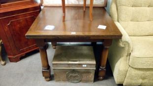 An oak draw leaf dining table