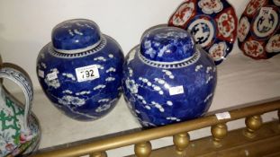 2 blue and white ginger jars