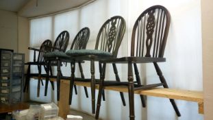 A set of 5 wheelback dining chairs