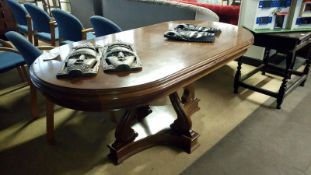A good quality oval dining table